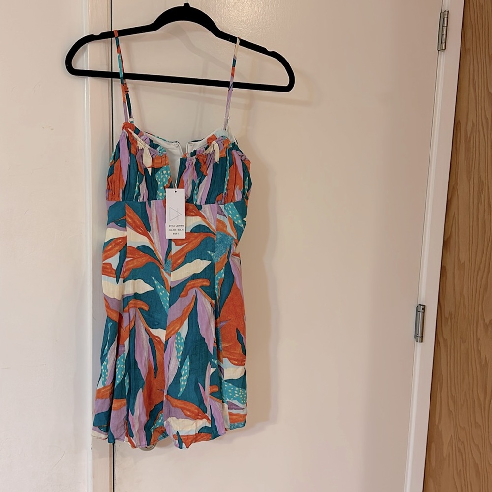 Sage The Label, multi color romper, shorts. Size L. Lining. Zipper/hook closure